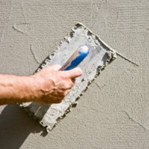 Cement being smoothed out with a special tool